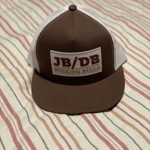 Dale Brisby hat , brown and white